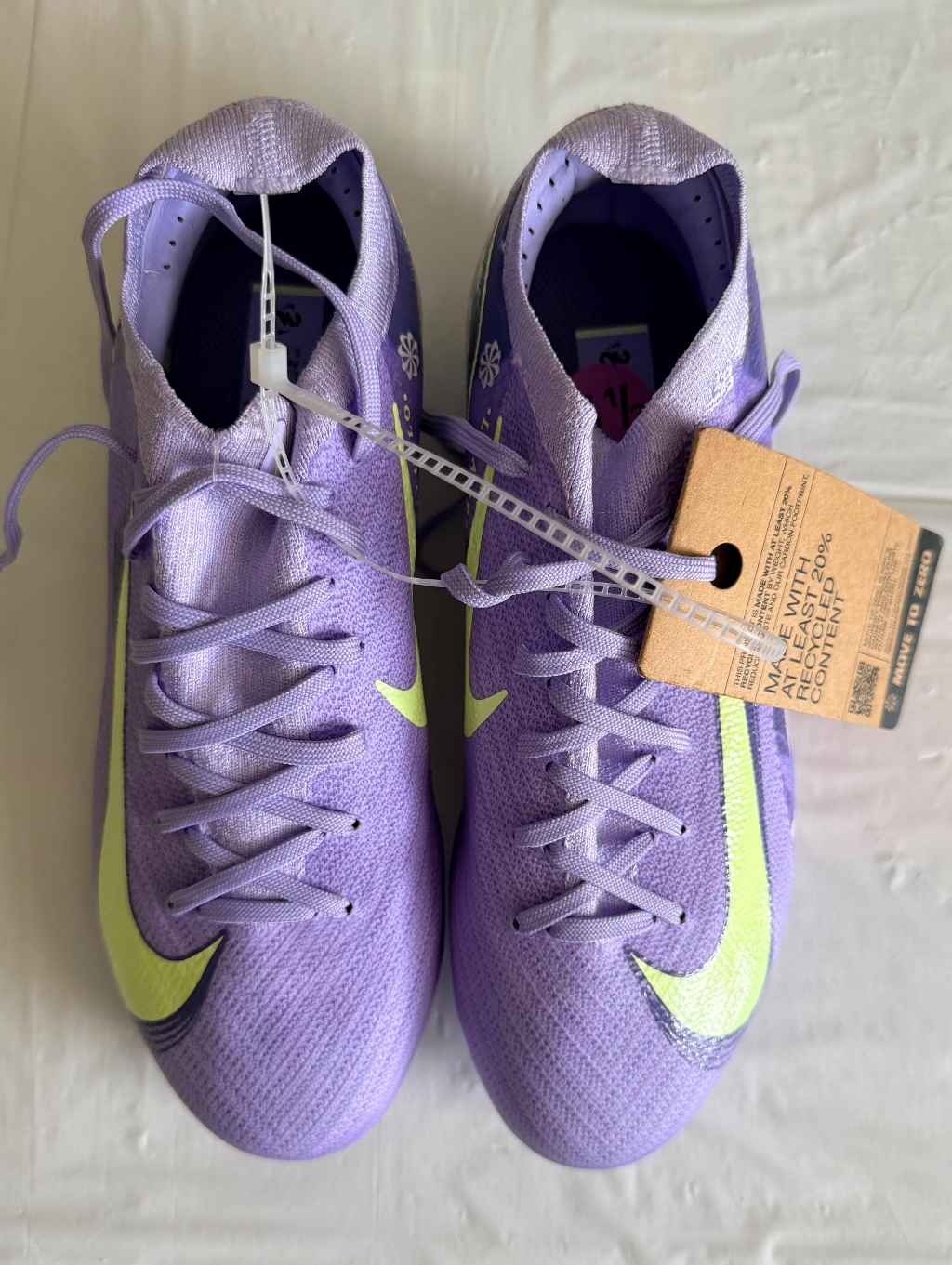 Nike Women’s Lavender Athletic Cleats With Lime Swoosh